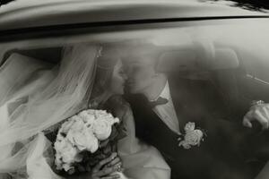 luxury elegant wedding couple embracing in stylish black car in light. gorgeous bride and handsome groom in retro style. black white photo