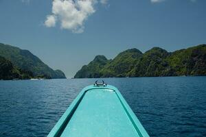 View from a traditional Filipino boat of an Matinloc island in Palawan. photo
