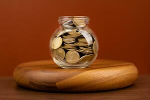 Saving money, coins, money concept and financial investment Cash loans, cash flow, equity, income, wages photo