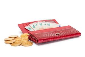Opened Red Women Purse with 10 Euro Banknotes Inside and Bitcoin Coins - Isolated on White Background. A Wallet Full of Money Symbolizing Wealth, Success, Shopping and Social Status - Isolation photo