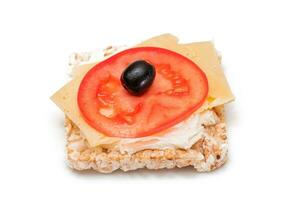 Rice Cake Sandwich with Tomato, Cheese and Olives - Isolated on White. Easy Breakfast. Diet Food. Quick and Healthy Sandwiches. Crispbread with Tasty Filling. Healthy Dietary Snack - Isolation photo