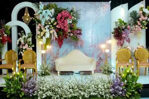 flower arrangements as a backdrop for wedding celebrations in Indonesia. photo