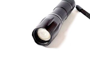 LED flashlight in white background photo