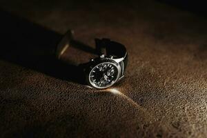 The morning of the groom and details, the details of the groom are dark. men's watch photo