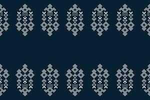 Ethnic geometric fabric pattern Cross Stitch.Ikat embroidery Ethnic oriental Pixel pattern navy blue background. Abstract,vector,illustration. Texture,clothing,scarf,decoration,motifs,silk wallpaper. vector