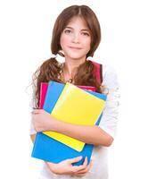 Cute schoolgirl with colorful books photo