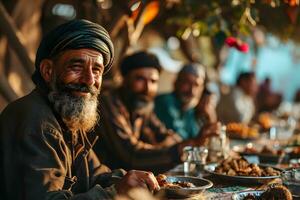 AI generated Happy and cheerful Middle Eastern old man sitting and enjoying a meal together outdoors. Generative Ai photo