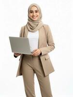 AI generated Career woman carrying laptop in her hand and wearing hijab, smiling expression and having white and clean teeth, studio photo, isolated white background photo