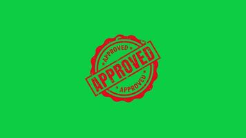 Red ink approved signed stamp animation on green screen background video