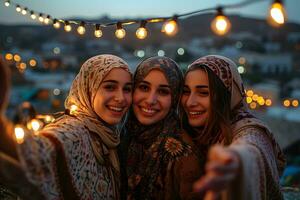 ai generado grupo de contento musulmán mujer vistiendo hijab tomando selfie con móvil teléfono a puesta de sol. generativo ai foto