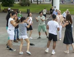 Moscow, Russia - 07.09.2023 - People enjoying day out in the Gorky park. Outdoors photo