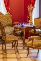 Shot of an old fashioned room with vintage chess board. Interior photo