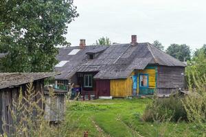Shot of the old teared huts in the village. Rural photo