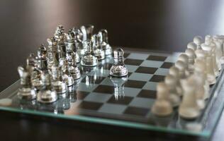 Close up shot of the chess board made of glass, Sports photo