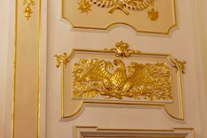 Nesvizh, Belarus - 08.23.2023 - Heraldic decorations on the walls of the Radzwill castle. History photo