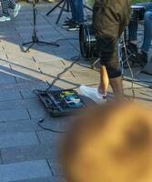 Concept shot of the musical amplifier device being turned on by the mans foot. Performance photo