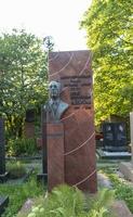 Moscow, Russia - 08.06.2023 - Memorial to the famous soviet russian radio presenter Yuriy Levitan at novodevichy cemetery. History photo