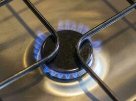 Close up shot of the gas burner from the gas cooker. Household photo