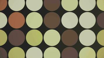 Trendy retro 1970s geometric pattern background with colorful blinking circles in vintage color tones - beige, brown and green. This nostalgic motion background animation is 4K and a seamless loop. video