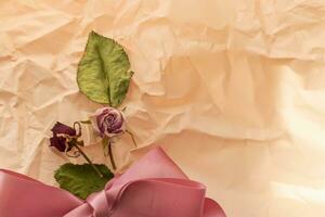 Concept shot of the background theme, wrapping paper, dried roses other flowers and other arrangements. Valentines day photo