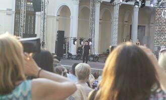 Moscow, Russia - 07.28.2023 - Concert of the rock band at VDNKH park. City photo