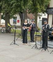 Brest, Belarus - 08.25.2023 - Jazz street band performing for public. Entertainment photo