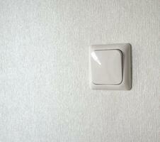 Close up shot of the electric switch in the apartment. Interior photo