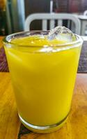 Orange fruit juice in restaurant PapaCharly Playa del Carmen Mexico. photo