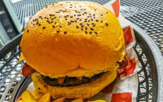 Fast food in the restaurant hamburger and fries in Mexico. photo