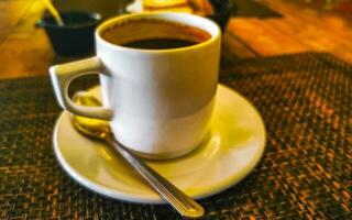 Cup of americano black coffee in restaurant cafe in Mexico. photo