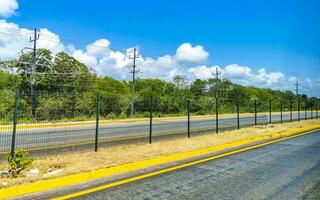 Driving the car on highway in Playa del Carmen Mexico. photo