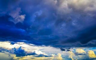 Colorful golden sky and clouds with sunset in Mexico. photo