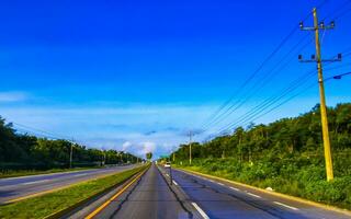 Driving the car on highway in Playa del Carmen Mexico. photo
