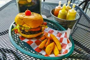 Fast food in the restaurant hamburger and fries in Mexico. photo