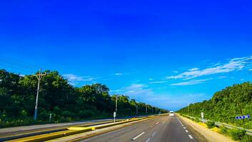 Driving the car on highway in Playa del Carmen Mexico. photo