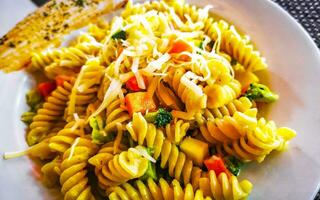 White plate of tasty pasta noodles meal dish food Mexico. photo