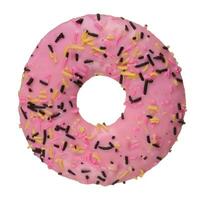 Donut covered with pink glaze and sprinkled with colorful sprinkles on isolated background photo