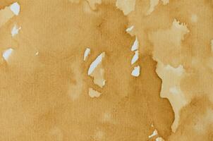 Texture of a white sheet of coffee drenched, full frame photo