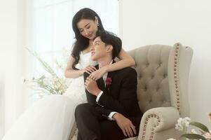 Couple of bride and groom enjoying romantic moments in wedding ceremony, Love, celebration and marriage. photo