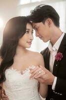 Couple of bride and groom enjoying romantic moments in wedding ceremony, Love, celebration and marriage. photo