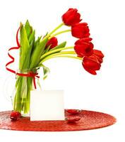 Red tulips bouquet in vase photo