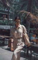 Gorgeous female on summer terrace of restaurant photo