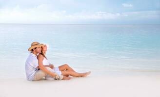 Romantic date on the beach photo