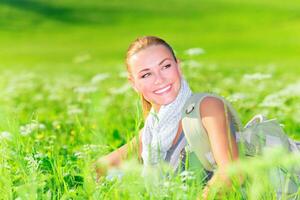 Cute female on floral field photo