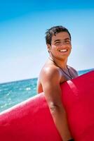 Cheerful surfboarder portrait photo