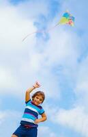 Baby girl play with kite photo