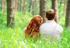 Couple relaxing in the park photo