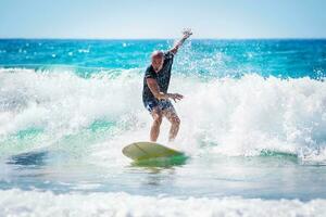 Surfer riding the wave photo