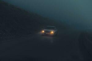 Car on the Night Misty Road photo