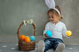 Happy Easter Bunny with Colorful Eggs photo